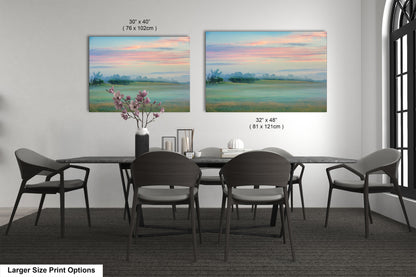 a dining table with four chairs and a vase of flowers