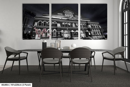 a black and white photo of a dining room