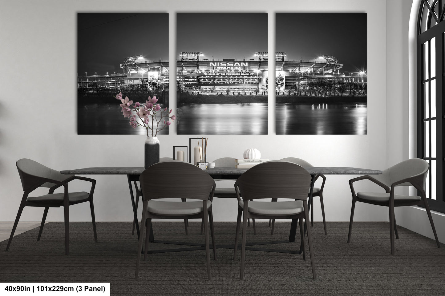 a black and white photo of a dining room