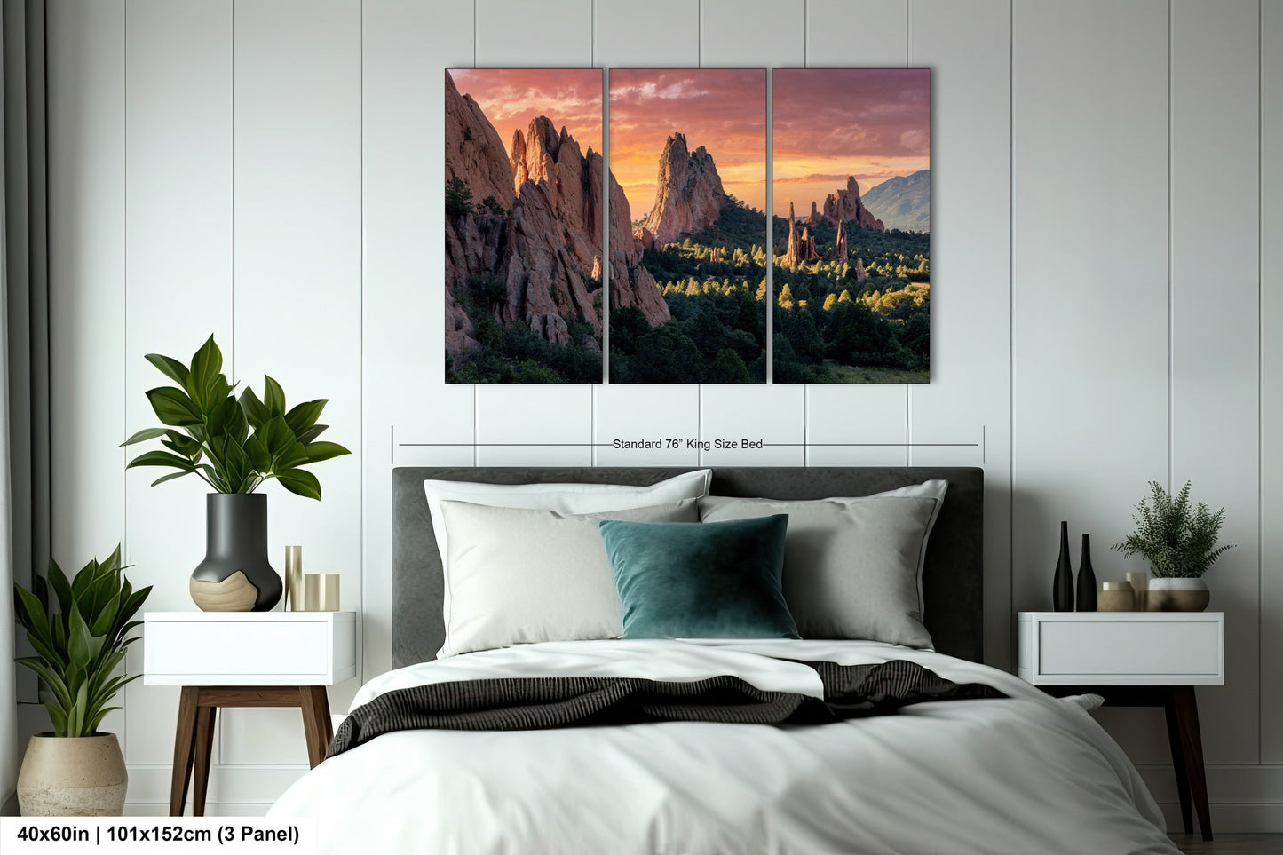 a bedroom with a large bed and a painting on the wall