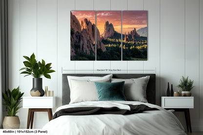 a bedroom with a large bed and a painting on the wall