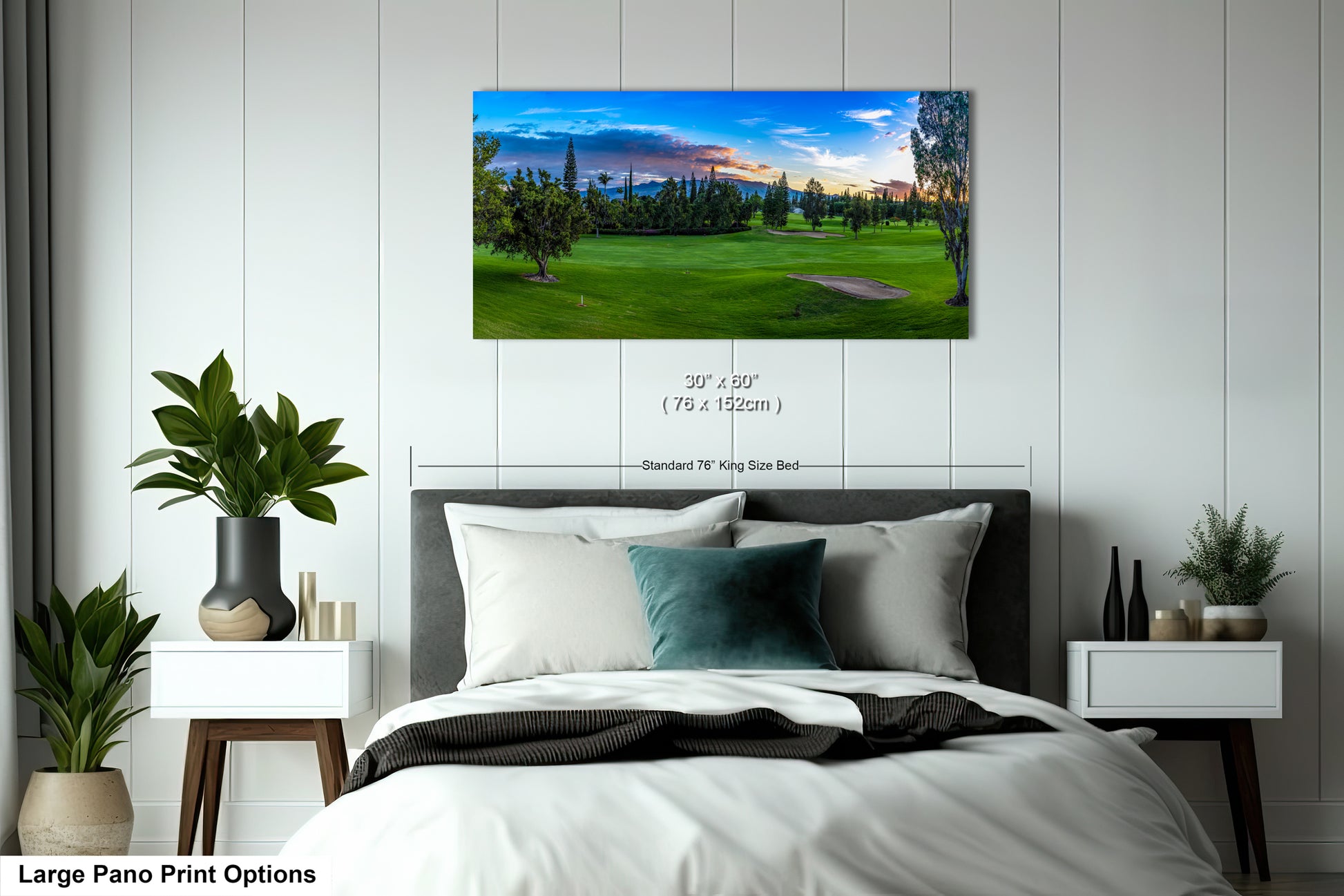 a bedroom with a large bed and a painting on the wall