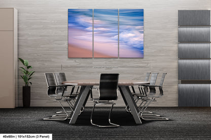 a dining room table with chairs and a painting on the wall
