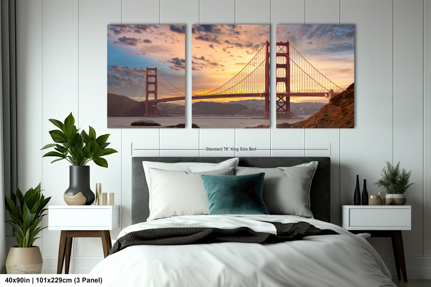 a bedroom with a bed and two paintings on the wall