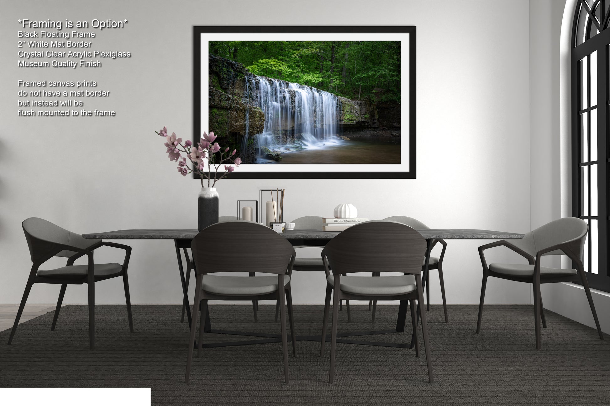 a dining room table with chairs and a waterfall in the background