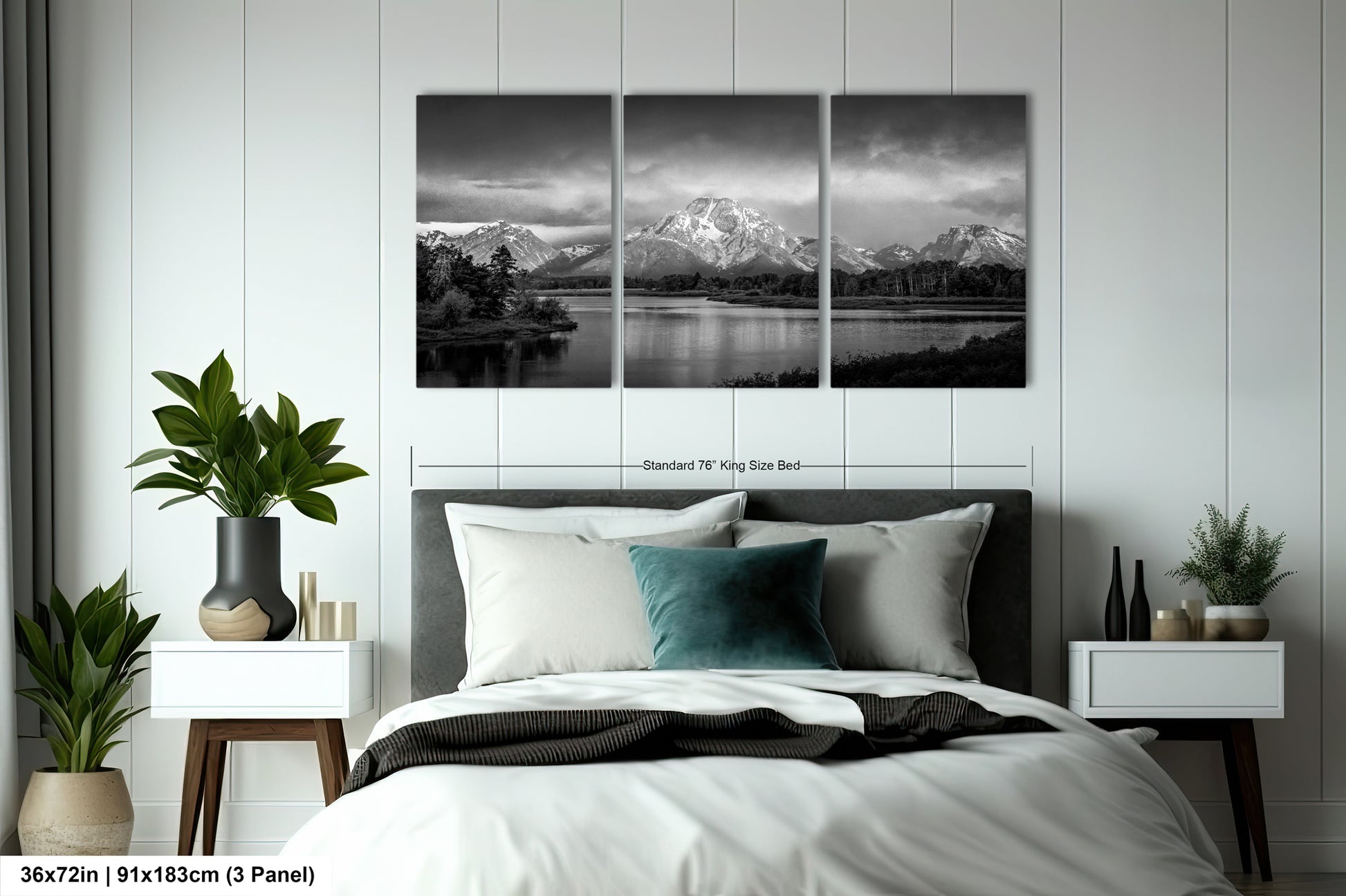 a black and white photo of a bed with a mountain range in the background