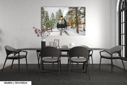 a dining room table with chairs and a painting on the wall