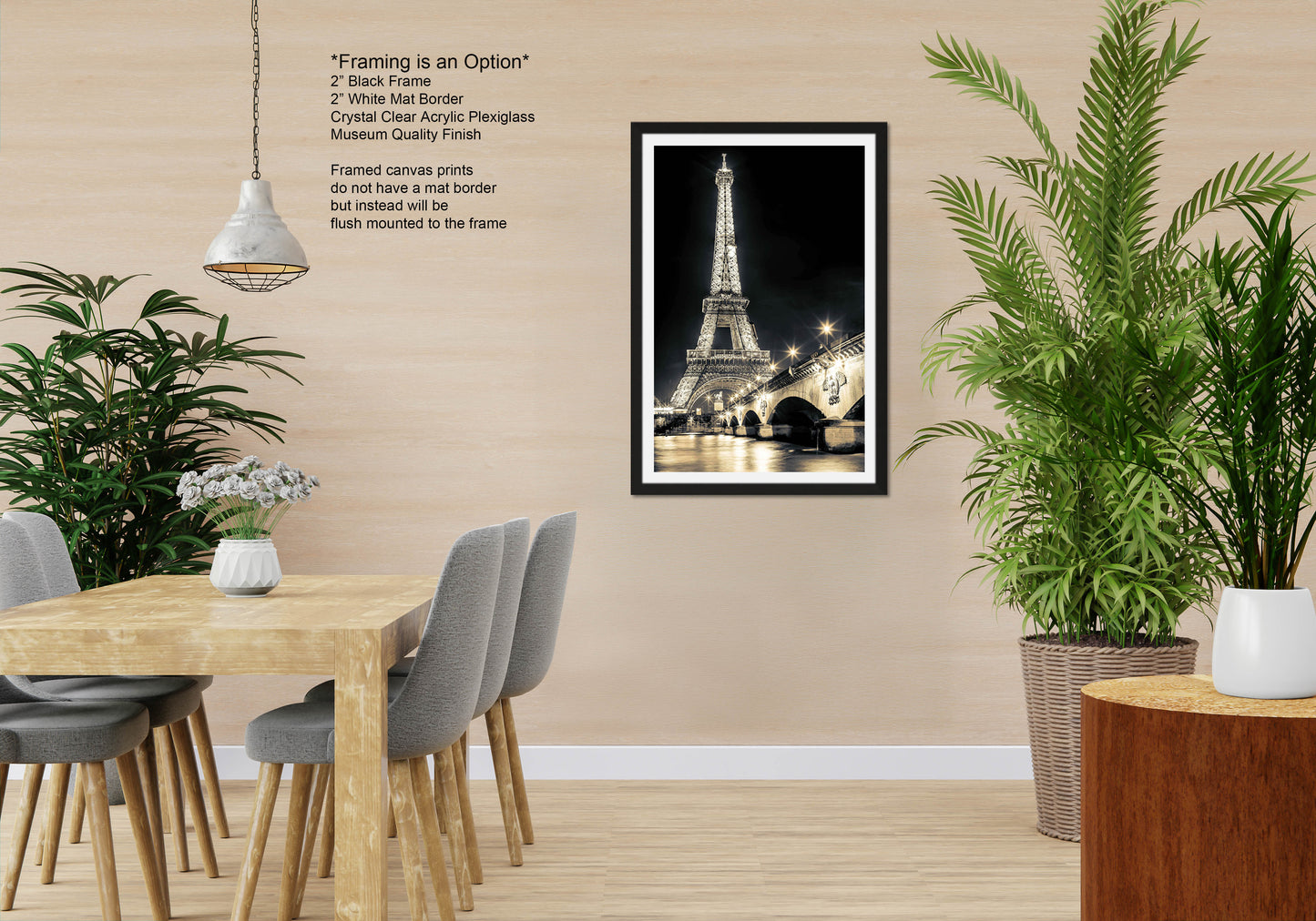 a room with a table and chairs and a picture of the eiffel tower