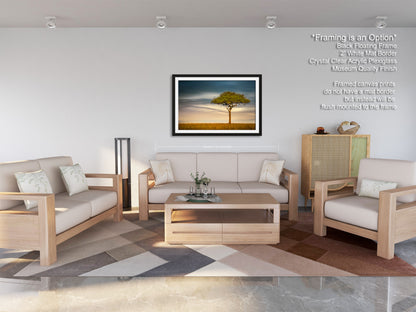 a living room filled with furniture and a painting on the wall