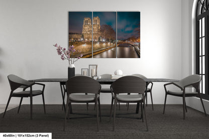 a dining room with a table and chairs