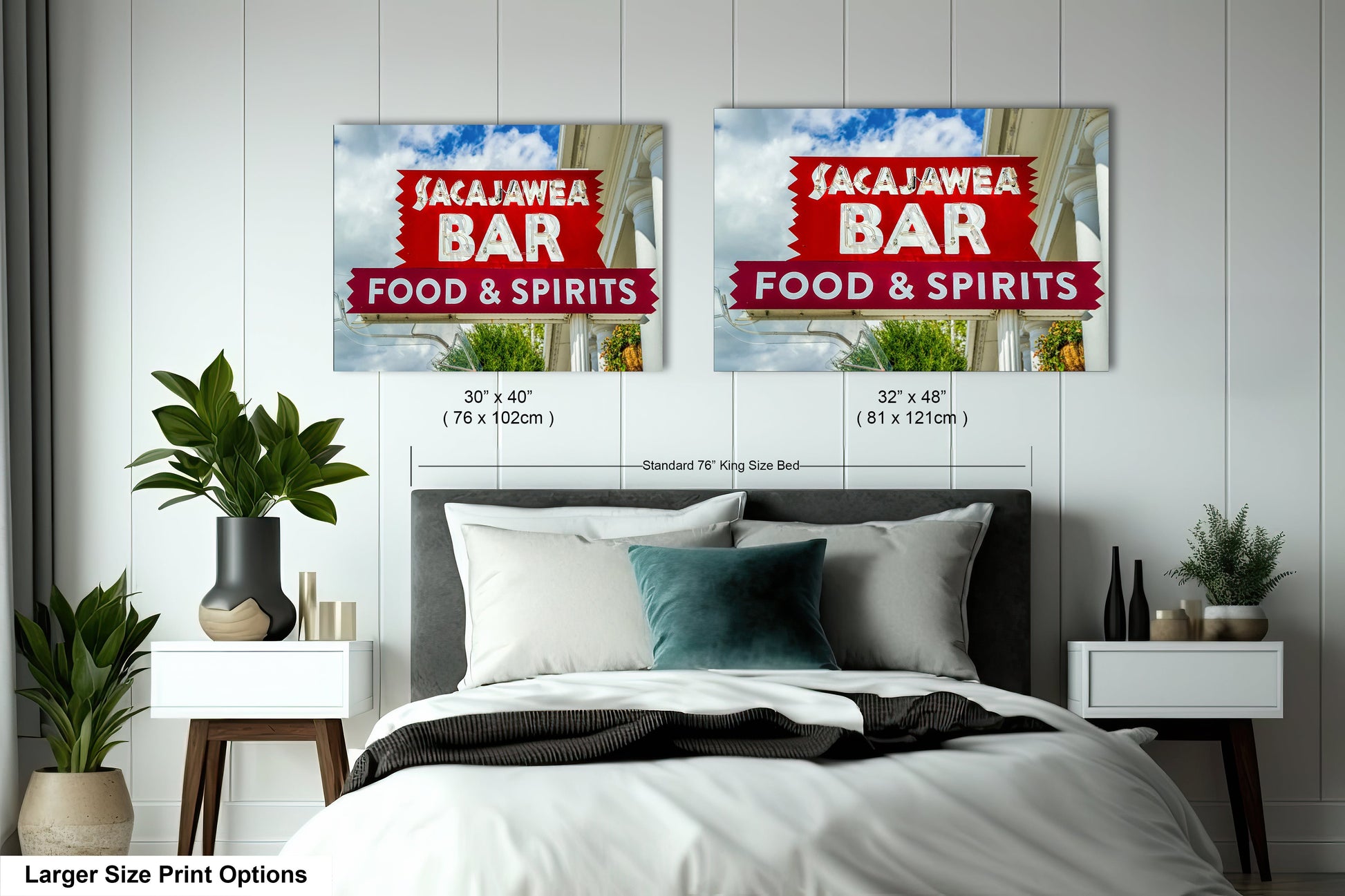 a bed room with a neatly made bed and two signs on the wall