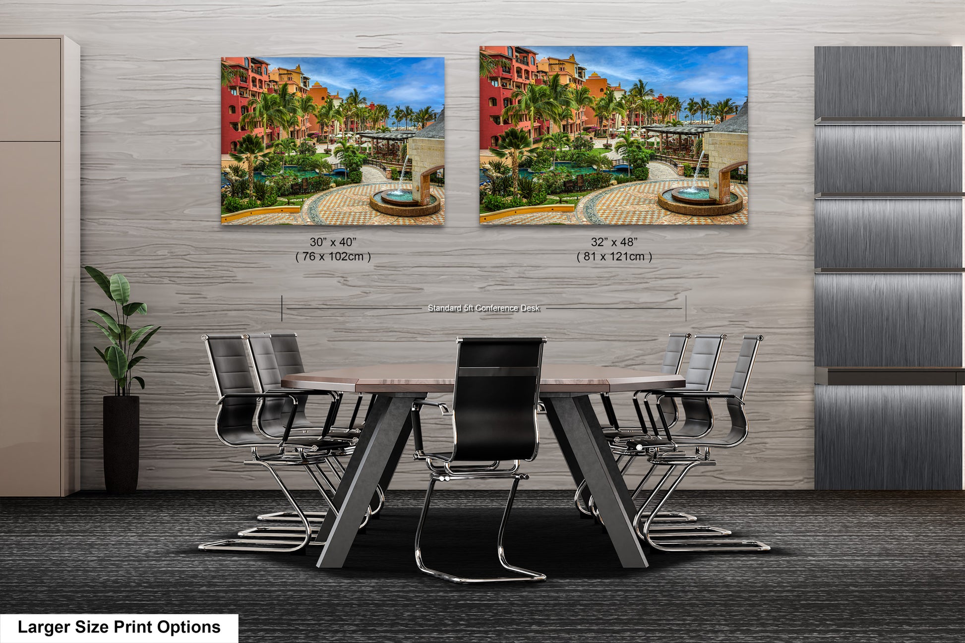 a dining room table with chairs and two pictures on the wall
