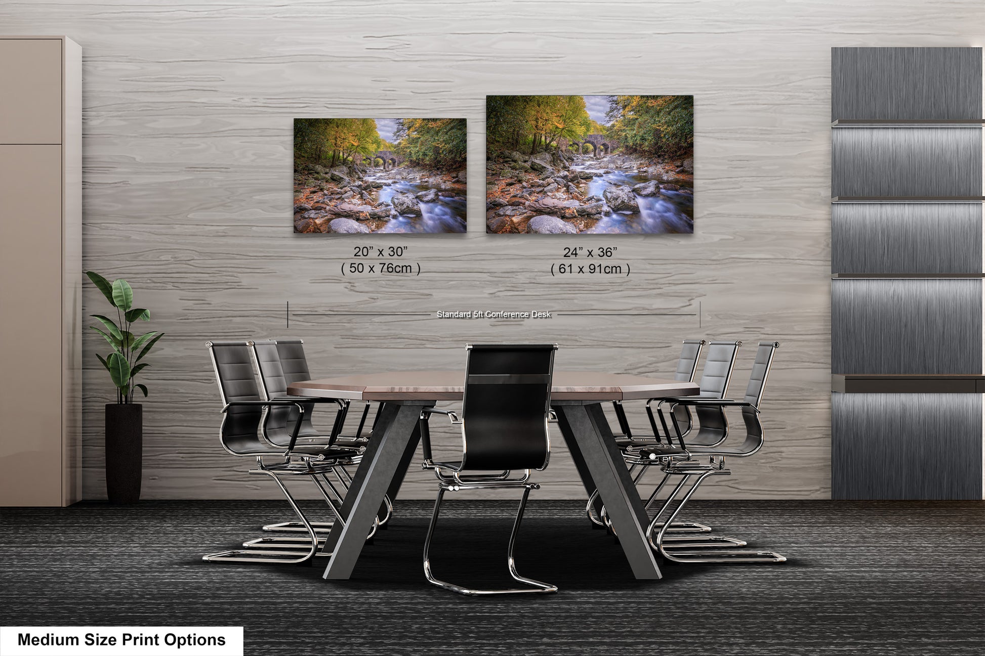 a dining room table with chairs and two pictures on the wall