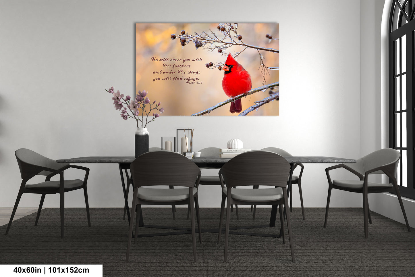 a cardinal sits on a branch in a dining room