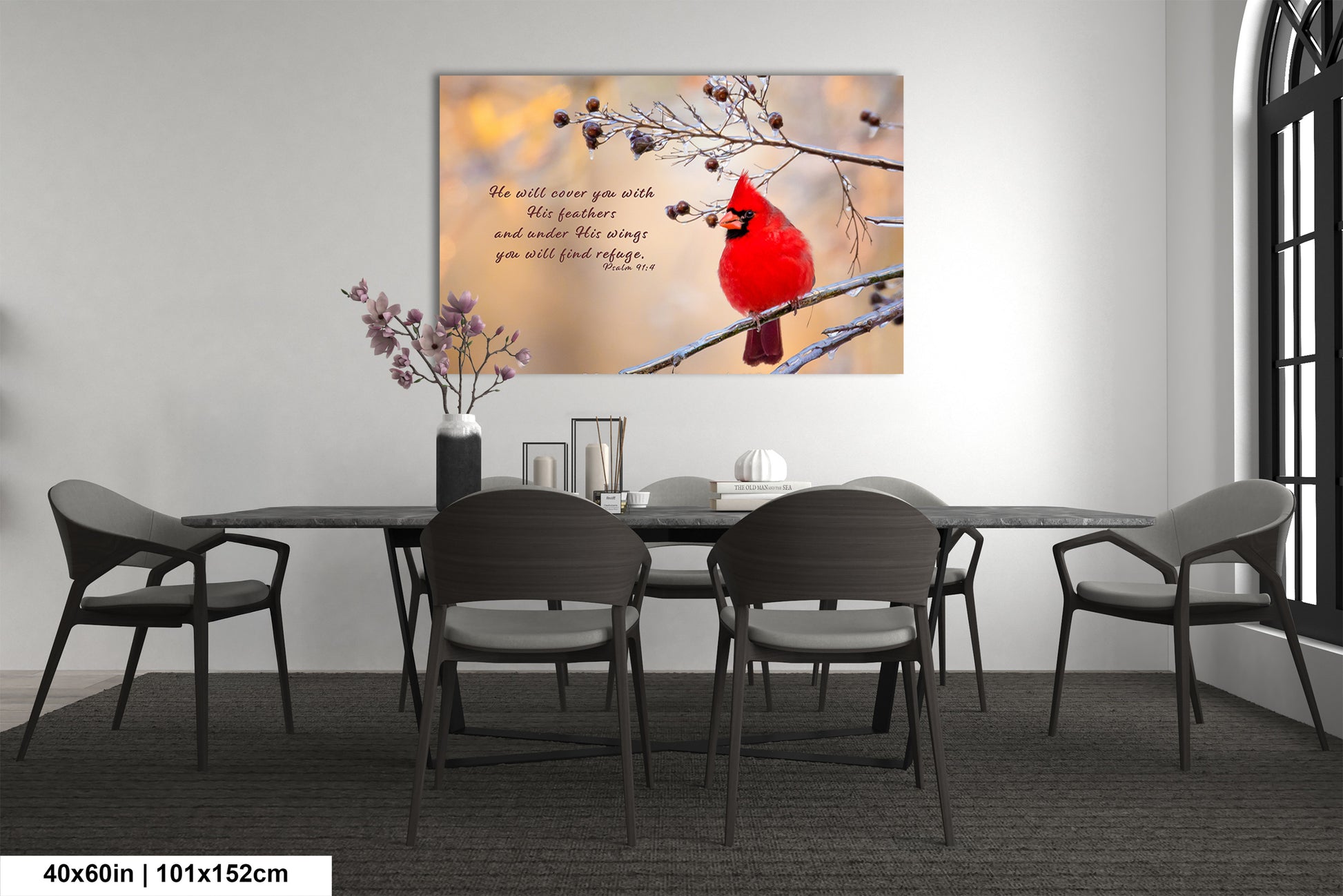 a cardinal sits on a branch in a dining room