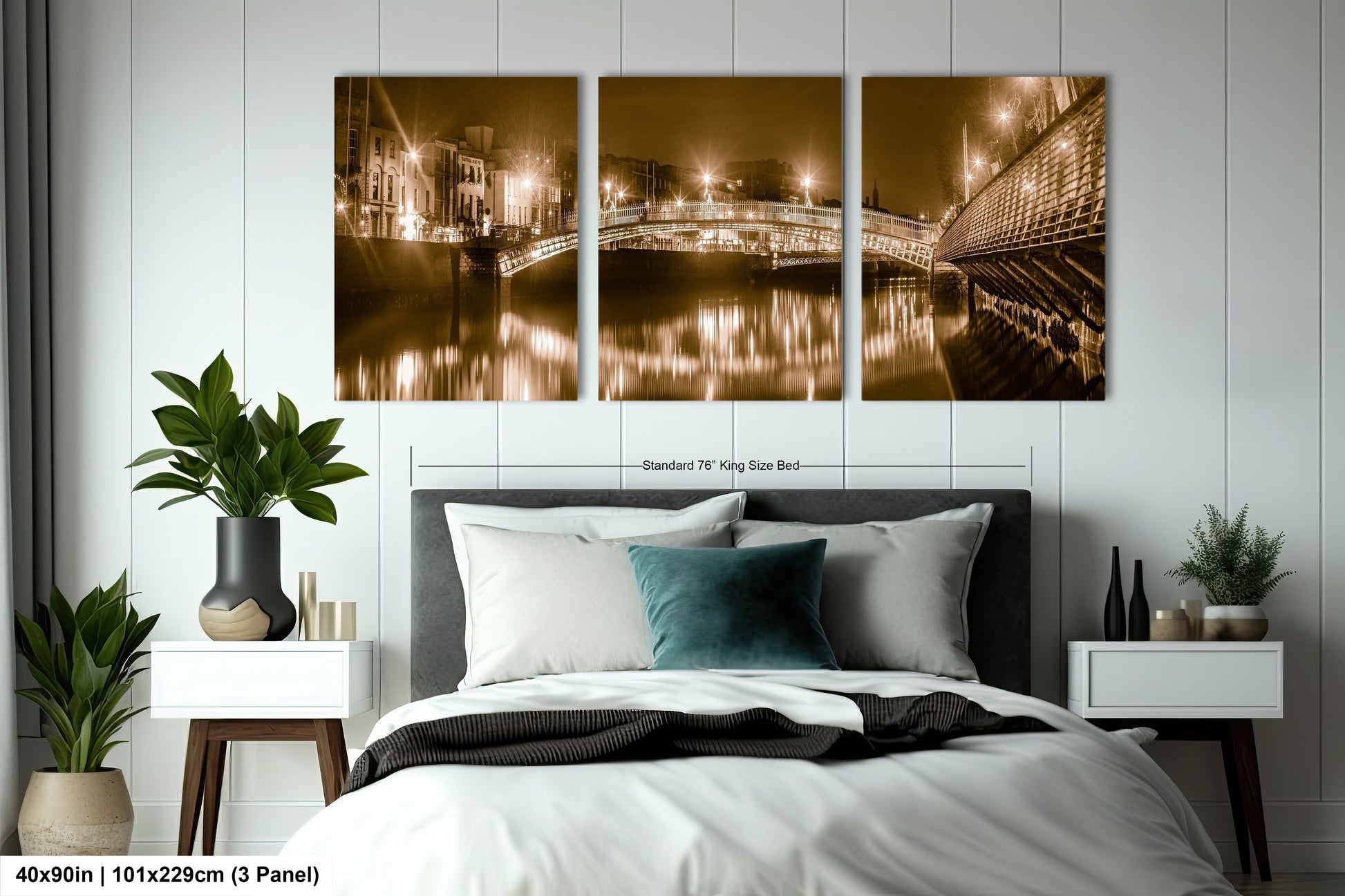 a bed room with a neatly made bed and two paintings on the wall