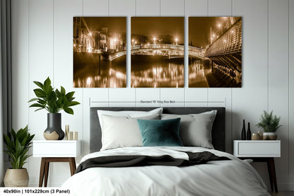 a bed room with a neatly made bed and two paintings on the wall