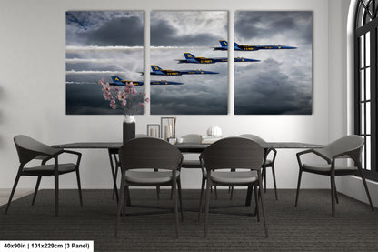a dining room table with chairs and a painting on the wall