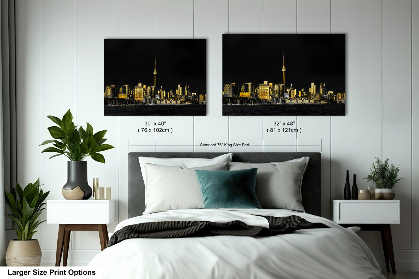 a bedroom with a bed and two pictures on the wall