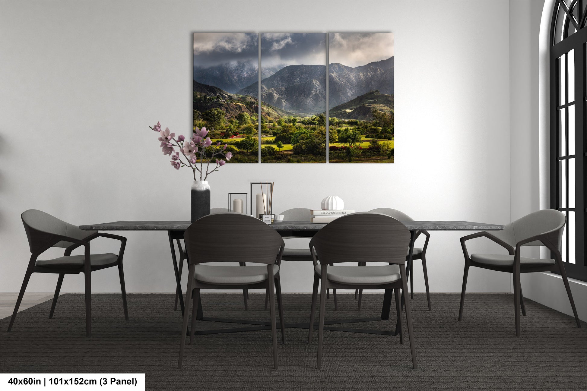 a dining room with a table and chairs