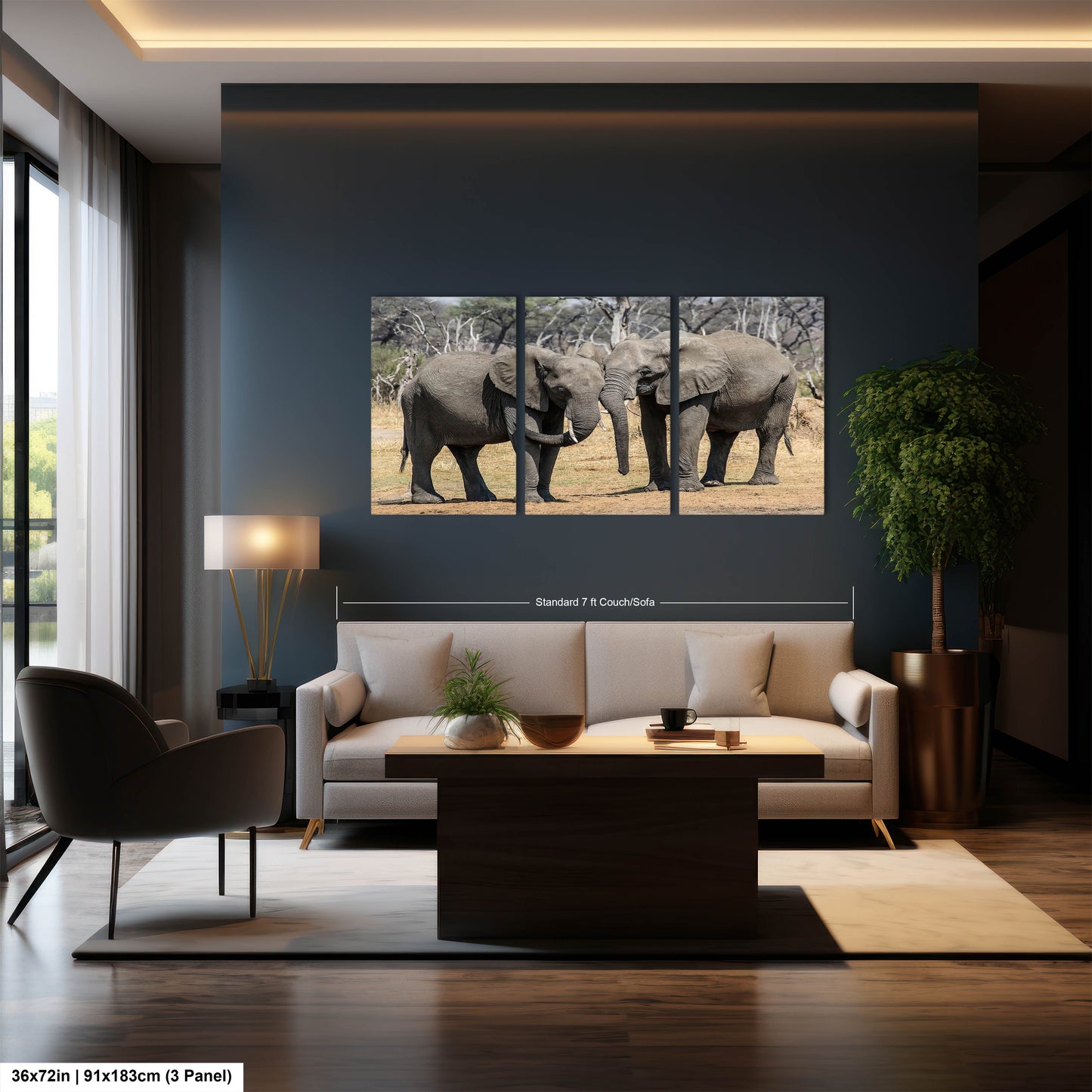a living room with a couch and two elephants on the wall