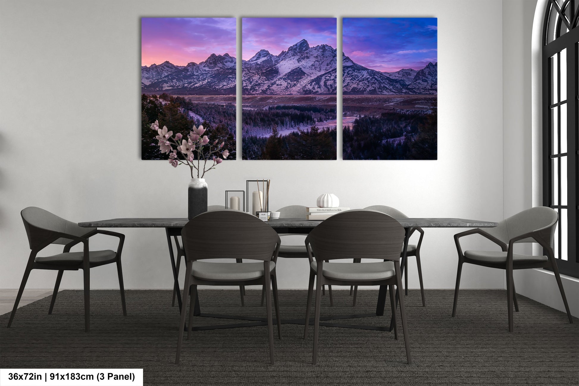 a dining room with a table and chairs