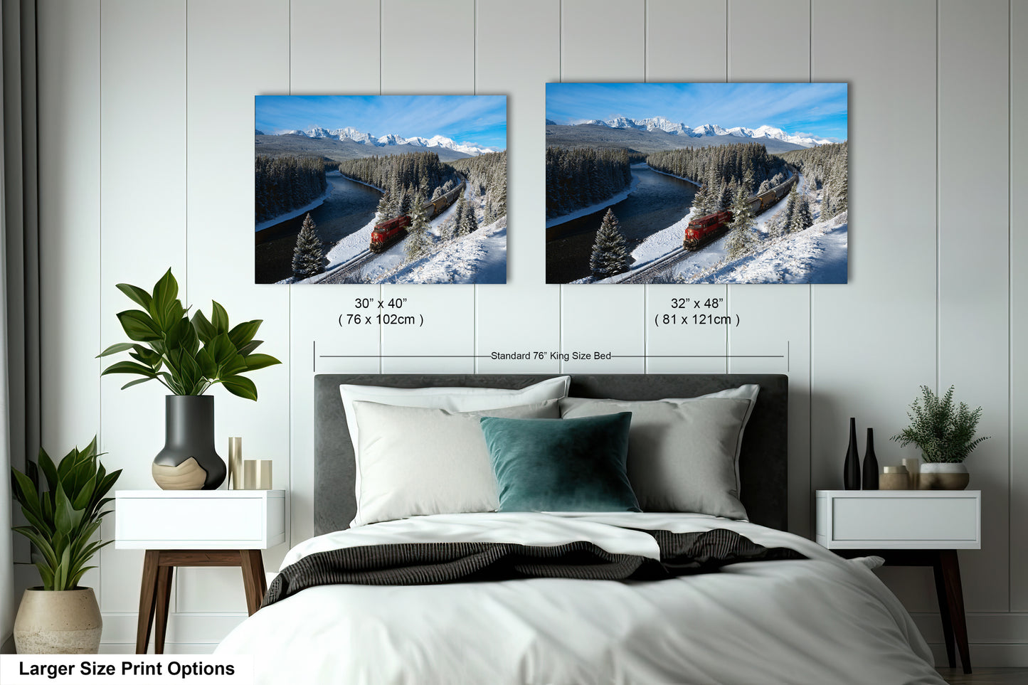 a bedroom with two framed pictures of a snowy mountain landscape hanging on the wall above a bed.