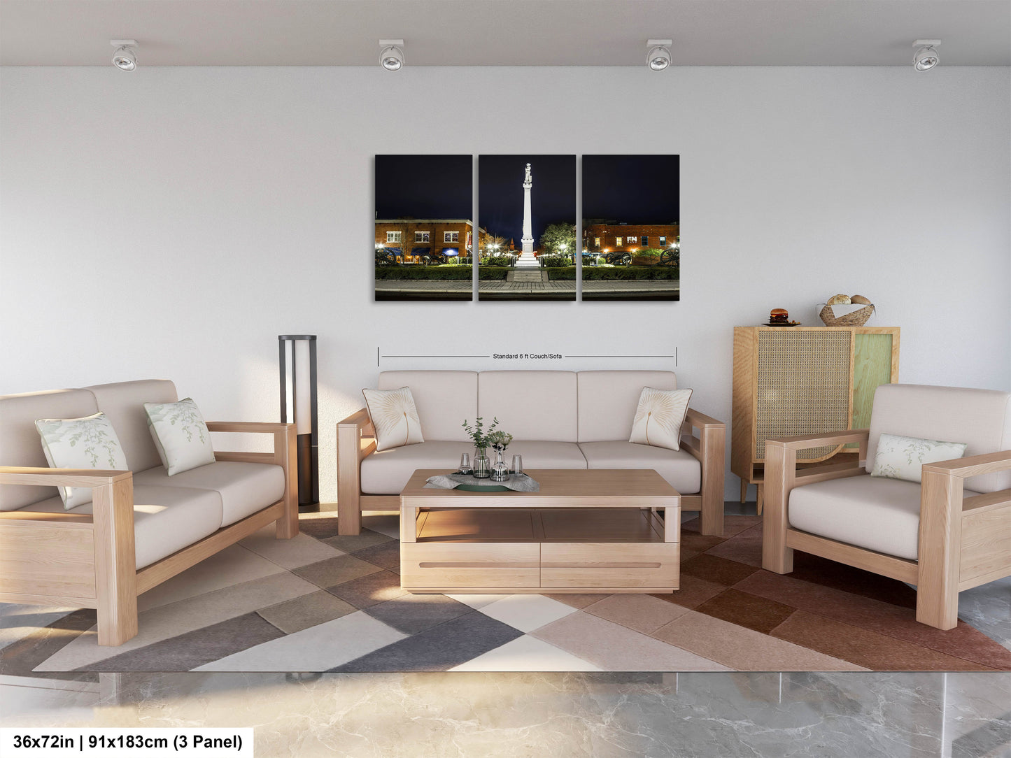 a living room filled with furniture and a painting on the wall