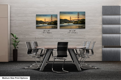 a dining room table with chairs and a picture of the golden gate bridge