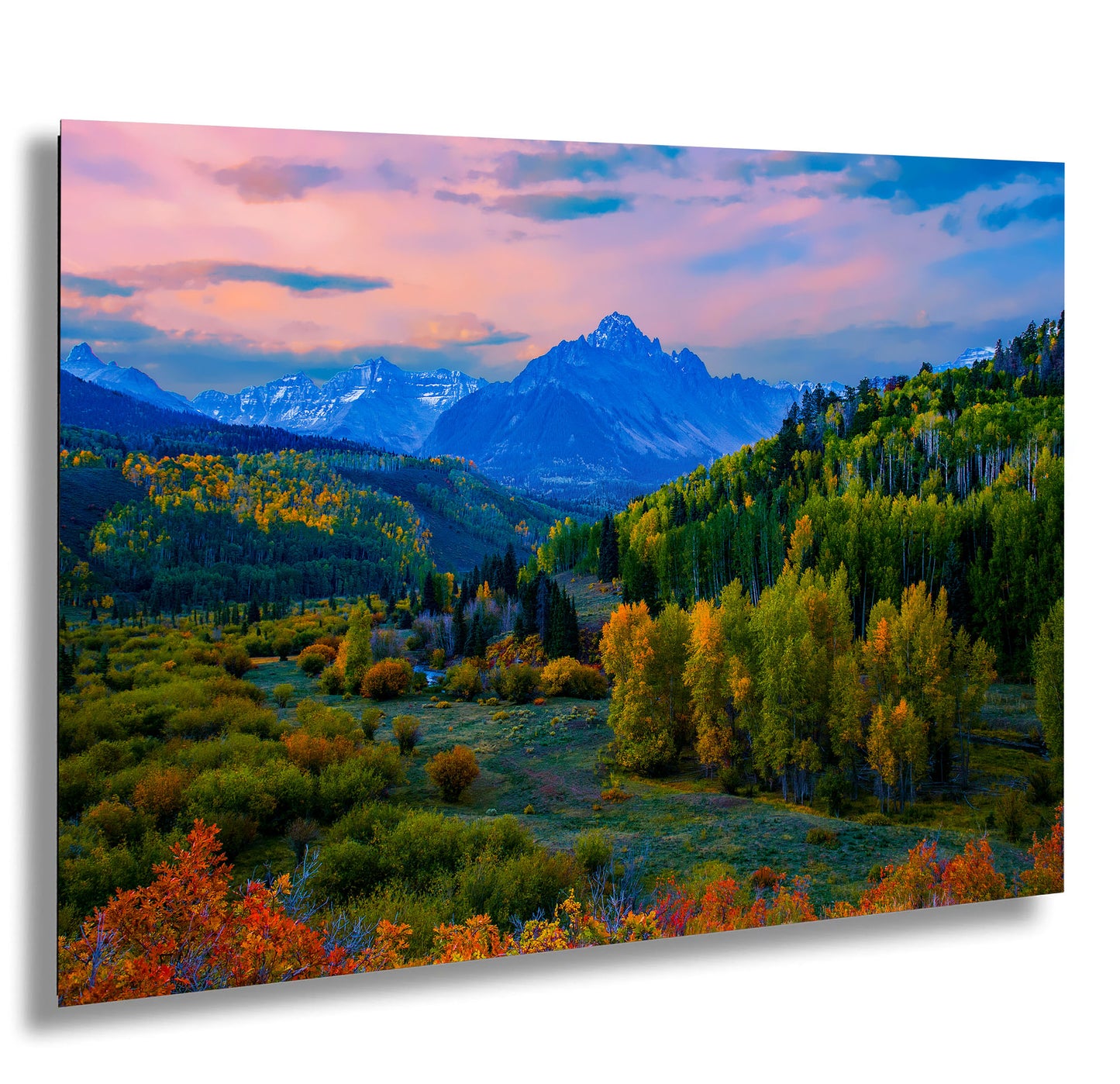 a painting of a mountain range with trees in the foreground