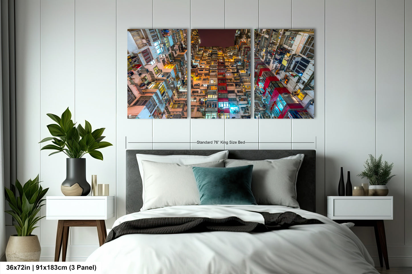 a bedroom with a bed and two paintings on the wall