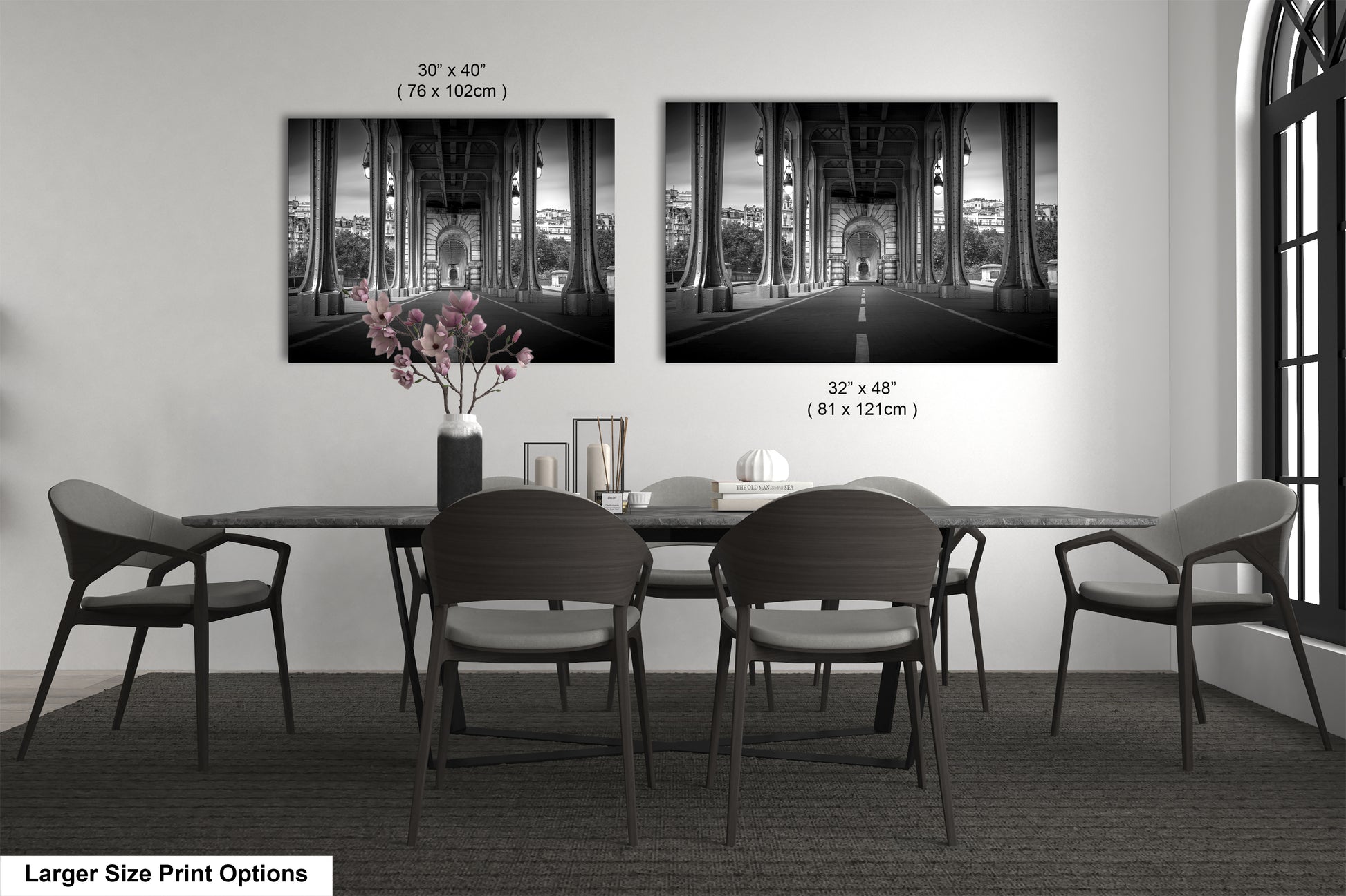a black and white photo of a dining room