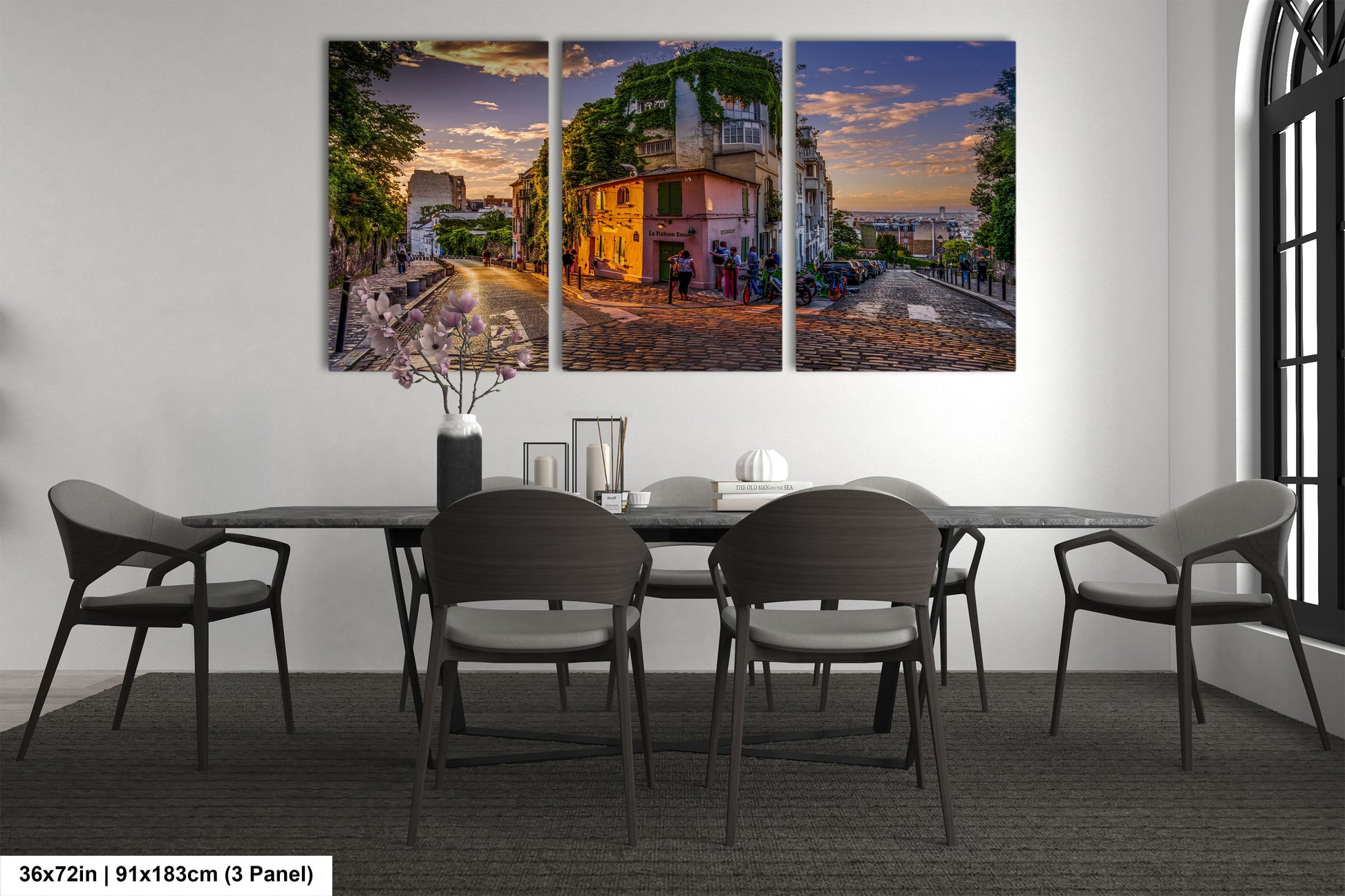 a dining room with a table and chairs