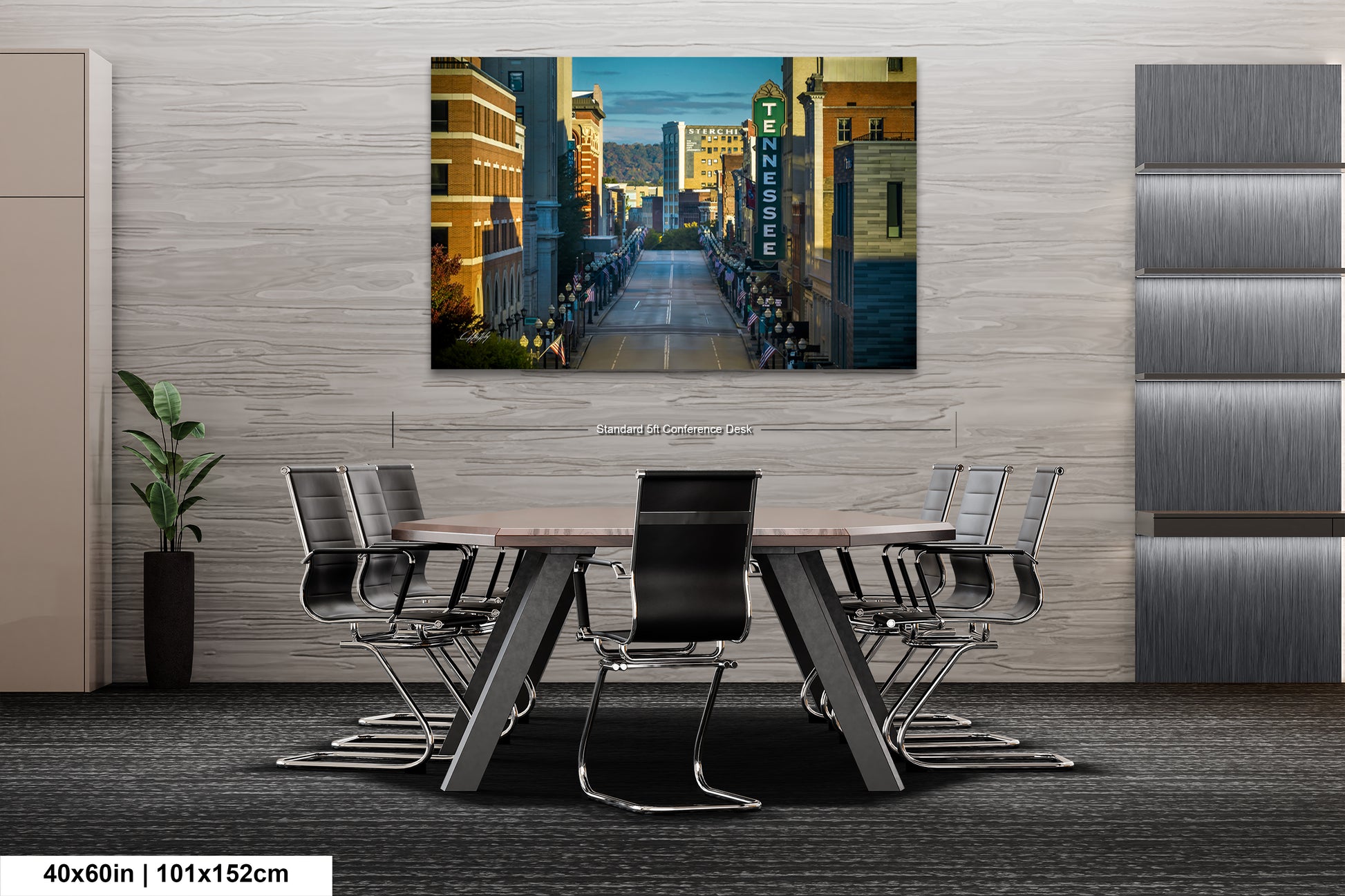 a dining room table with chairs and a painting on the wall