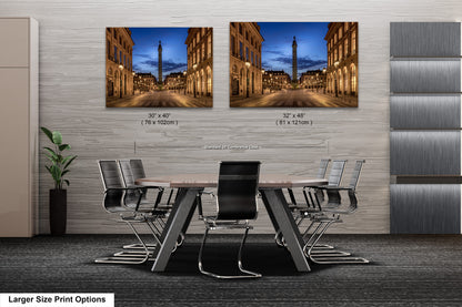 a dining room table with chairs in front of two pictures of a city