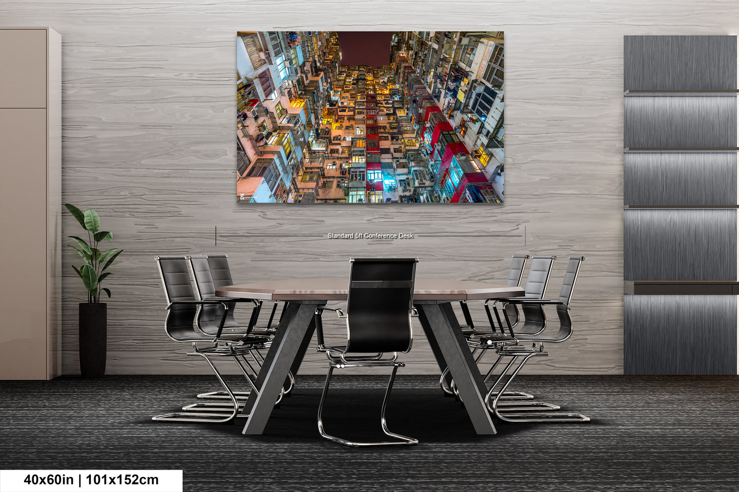 a room with a table and chairs and a painting on the wall