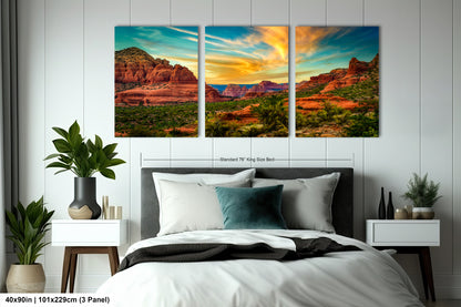 a bed room with a neatly made bed and two paintings on the wall