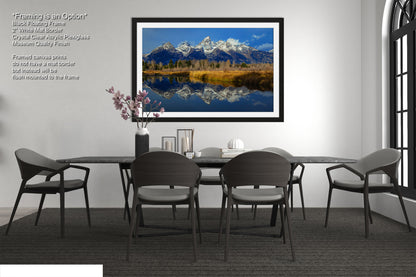 a picture of a dining room with a table and chairs
