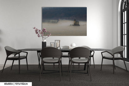 a dining room table with chairs and a vase of flowers