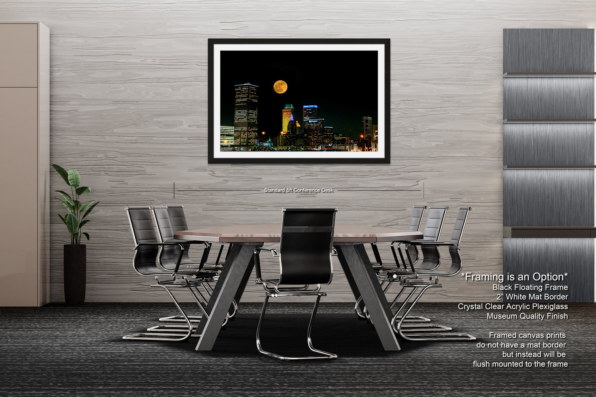 a picture of a city at night with a full moon