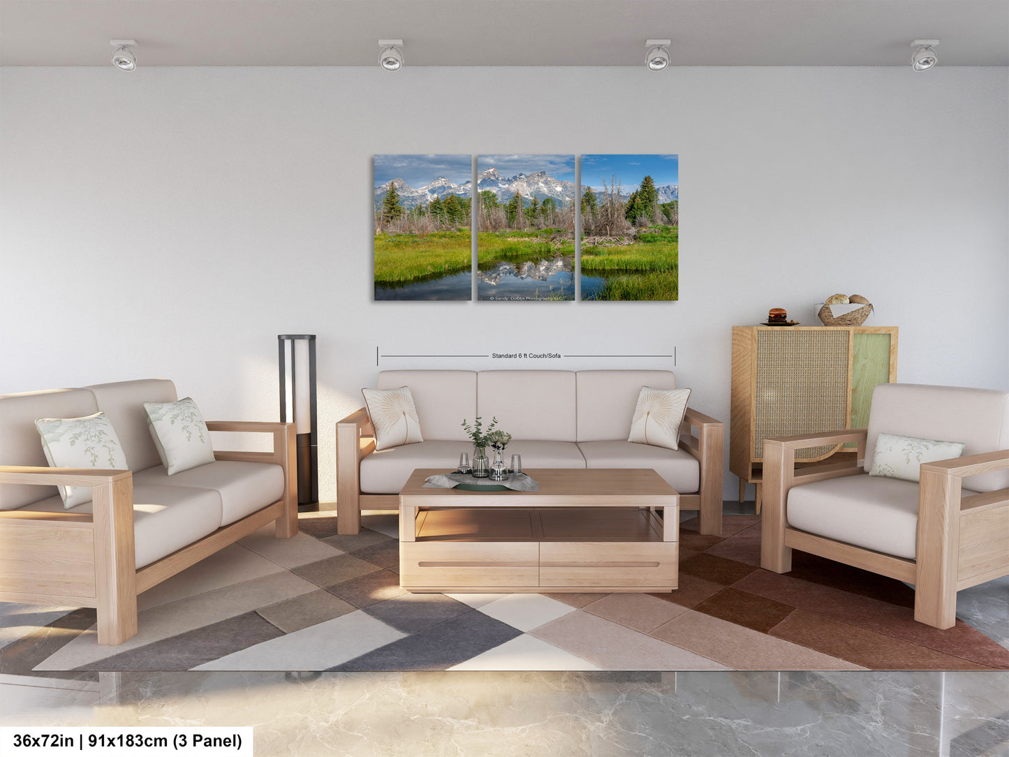 a living room filled with furniture and a painting on the wall