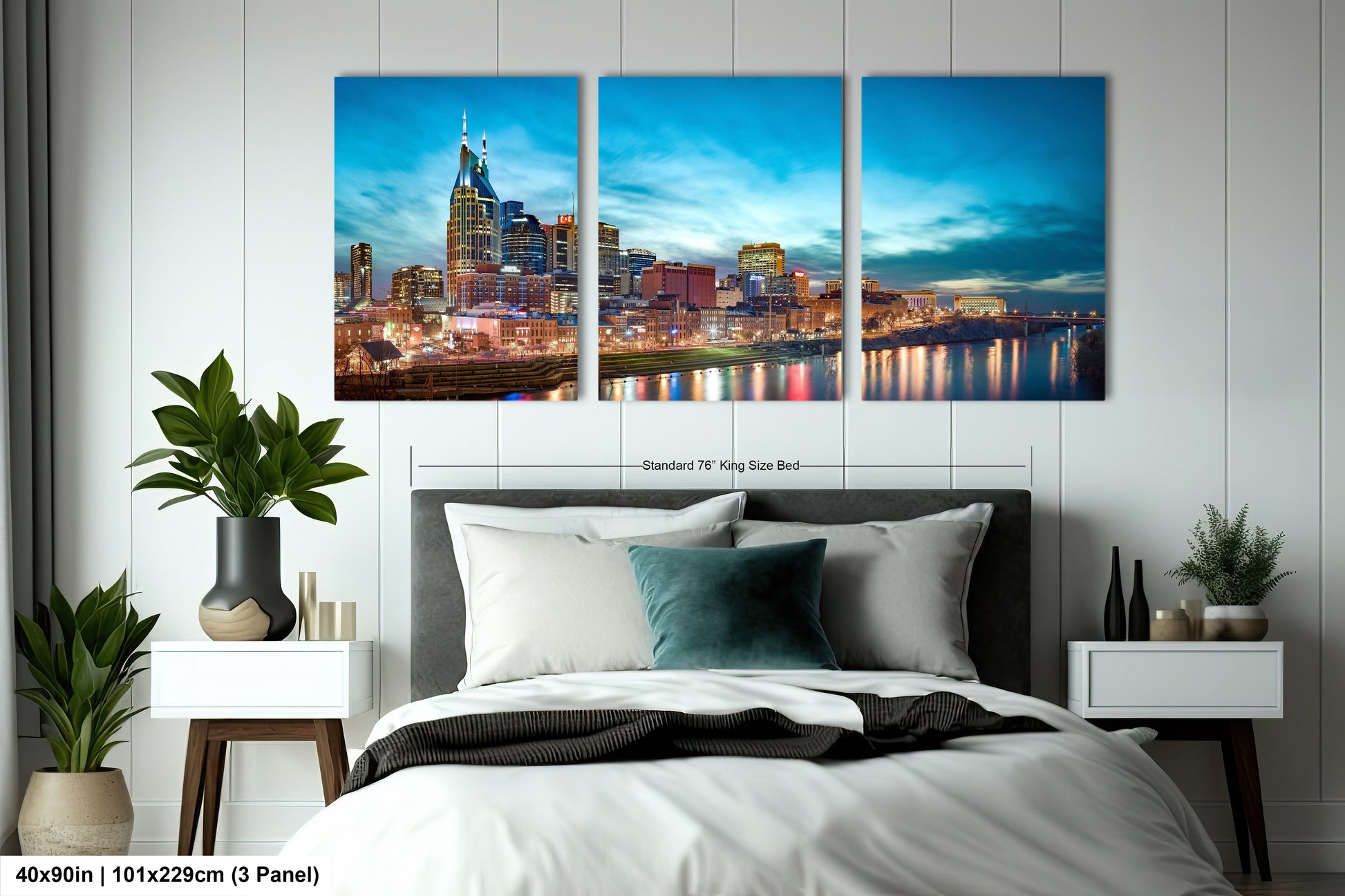 a bedroom with a bed and two paintings on the wall