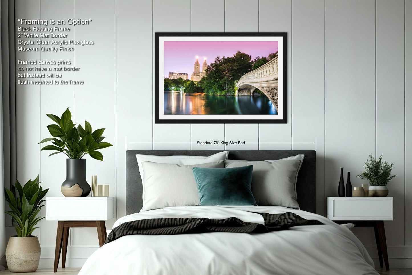 a bedroom with a bed and a picture hanging on the wall