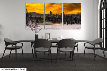 a dining room table with four chairs and a painting on the wall
