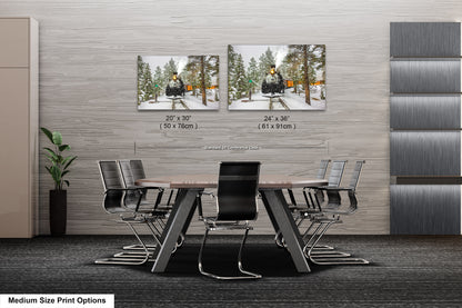 a dining room table with chairs and two pictures on the wall