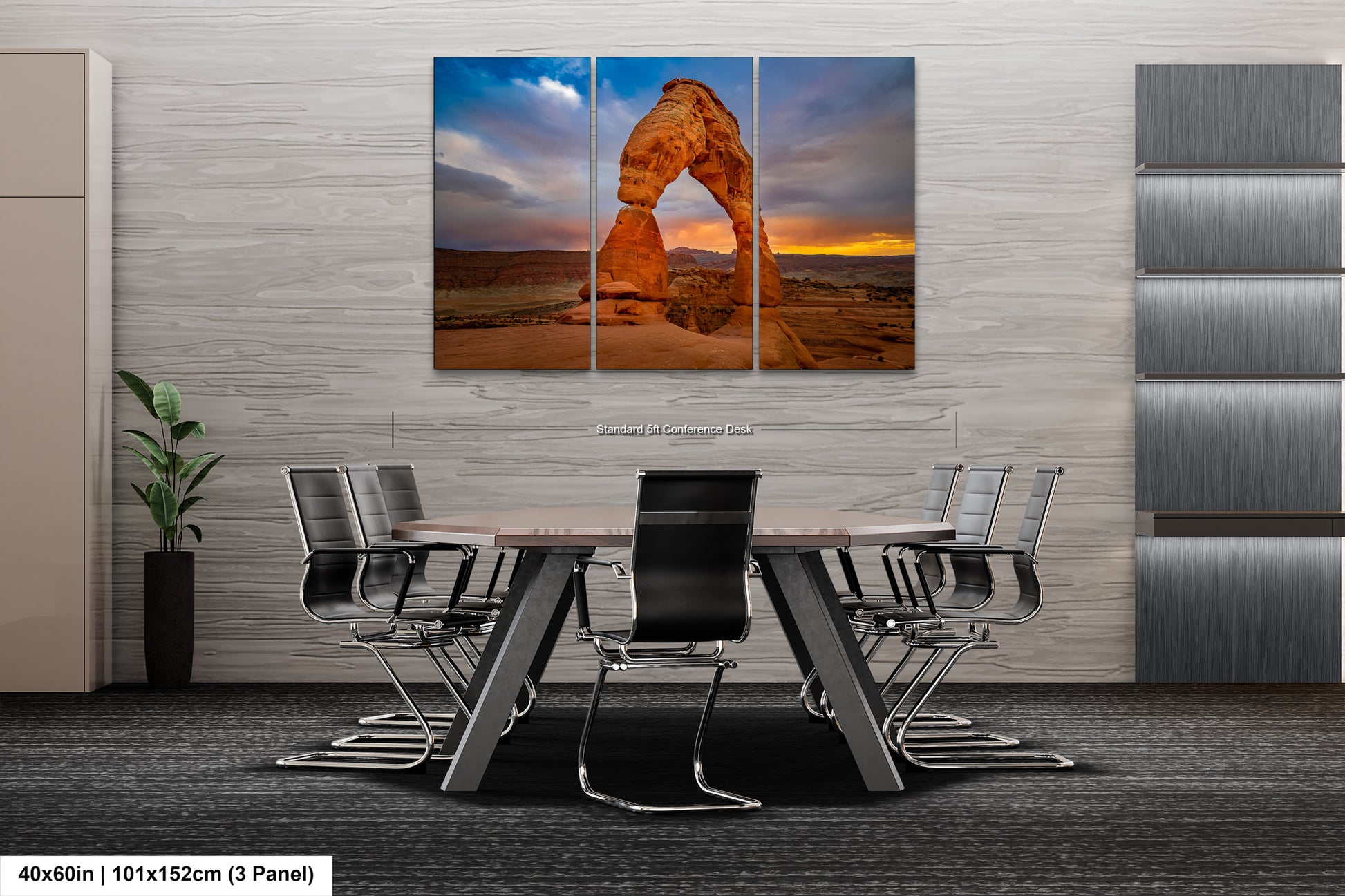 a dining room table with chairs and a large picture of a rock formation