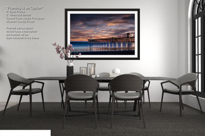 a picture of a dining room with a table and chairs