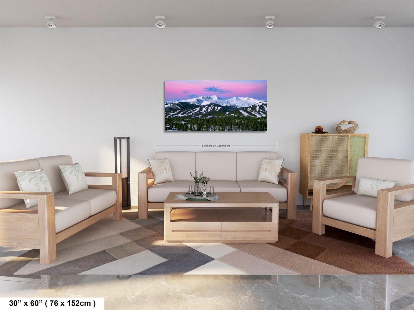 a living room filled with furniture and a painting on the wall