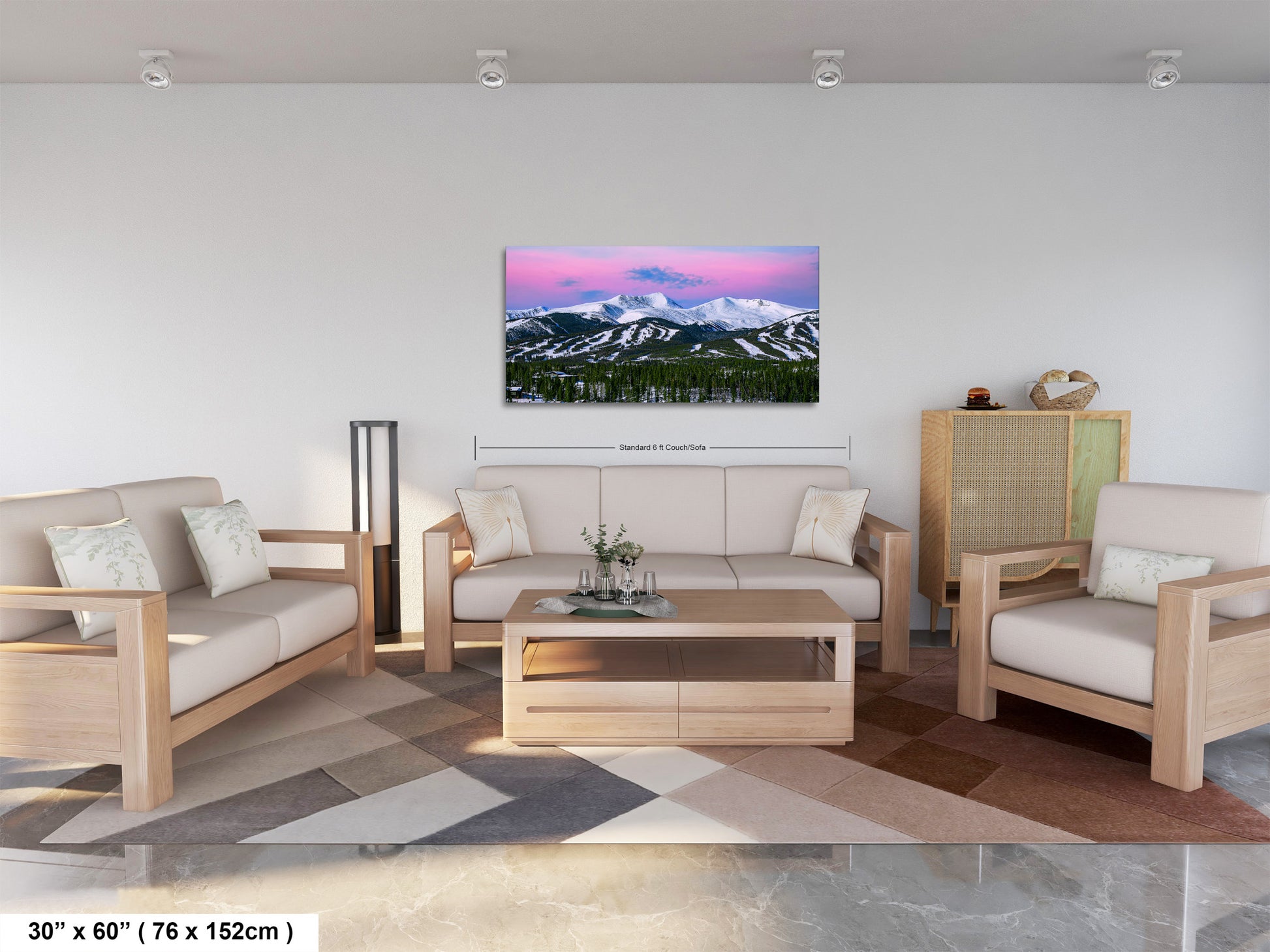 a living room filled with furniture and a painting on the wall