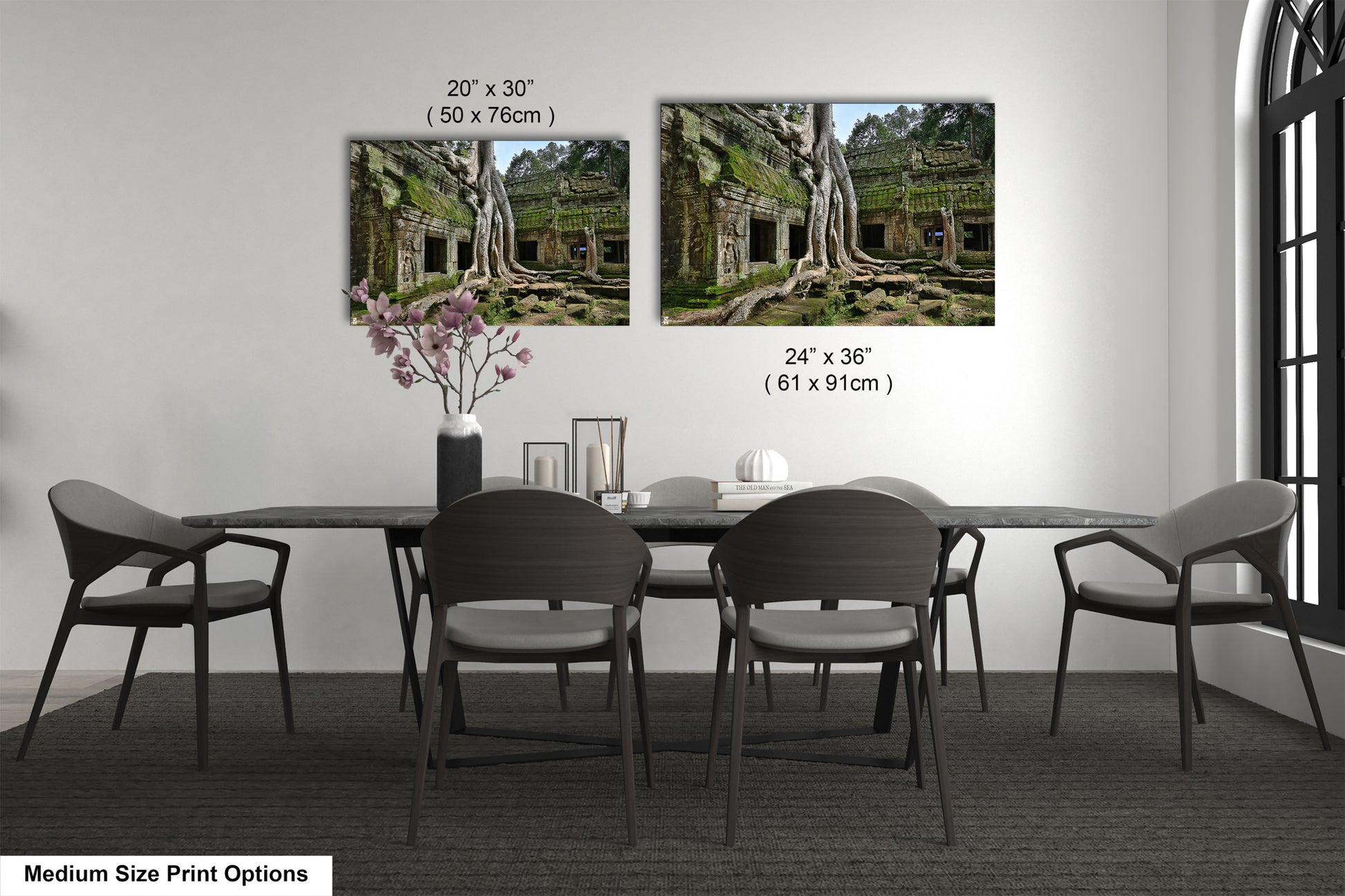 a dining room table with chairs and a vase of flowers